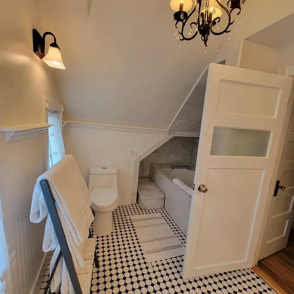 Compact attic bathroom with modern fixtures